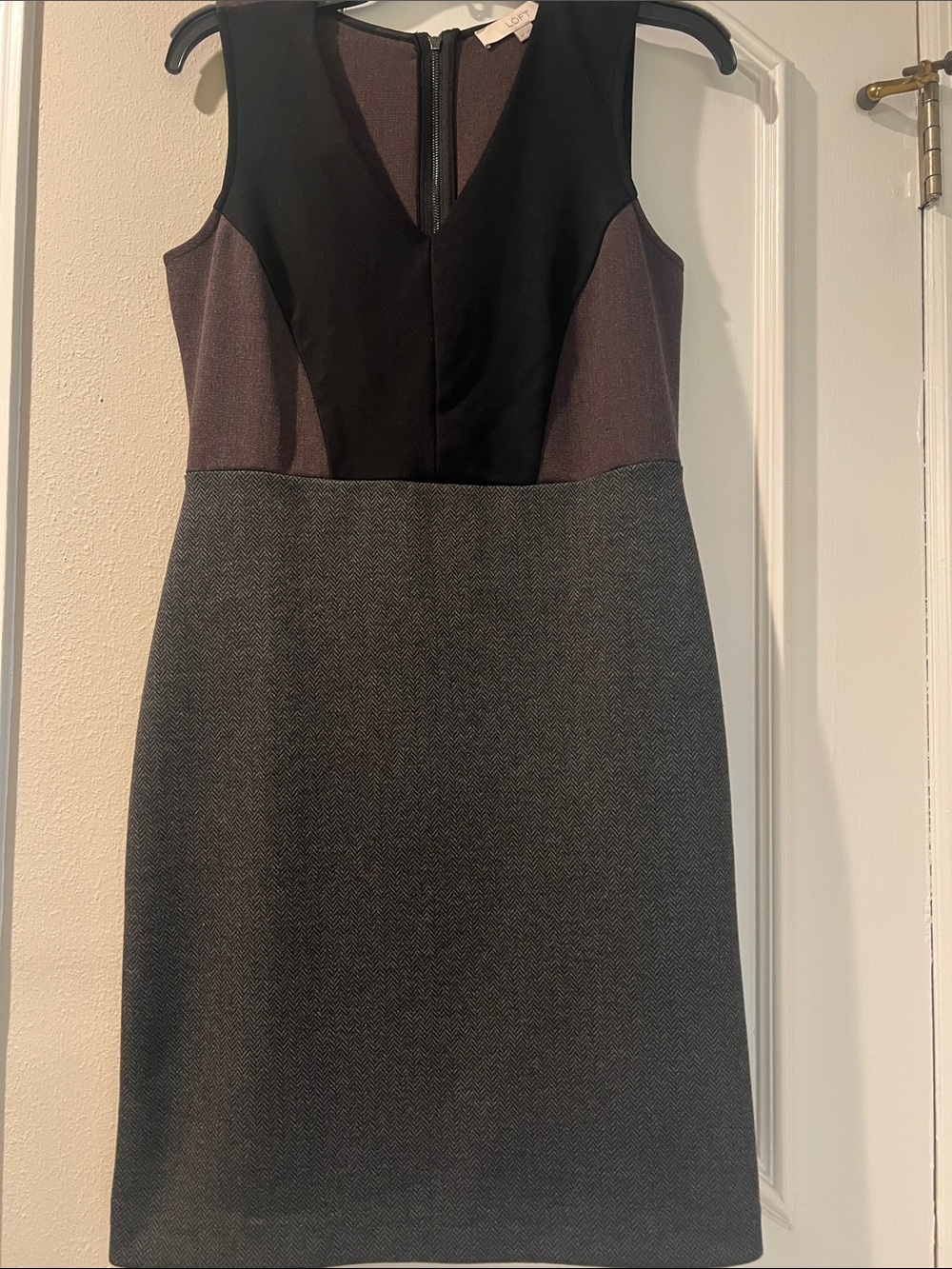 Worn 1x, size 4P, LOFT Sleeveless V Neck Dress in Black, plum & gray bottom.